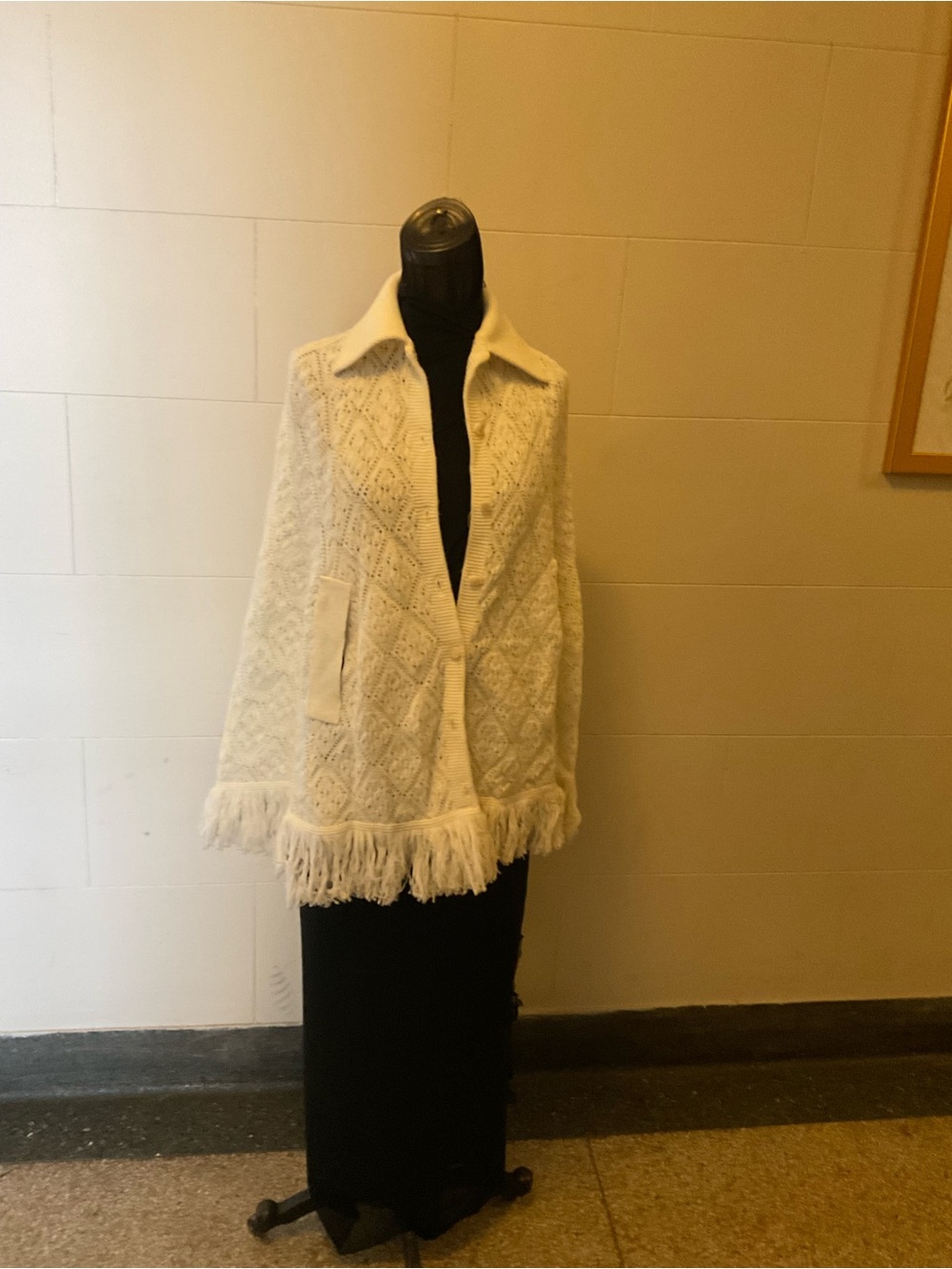 Sweater vintage white button down with vertical welts sliding arms through—